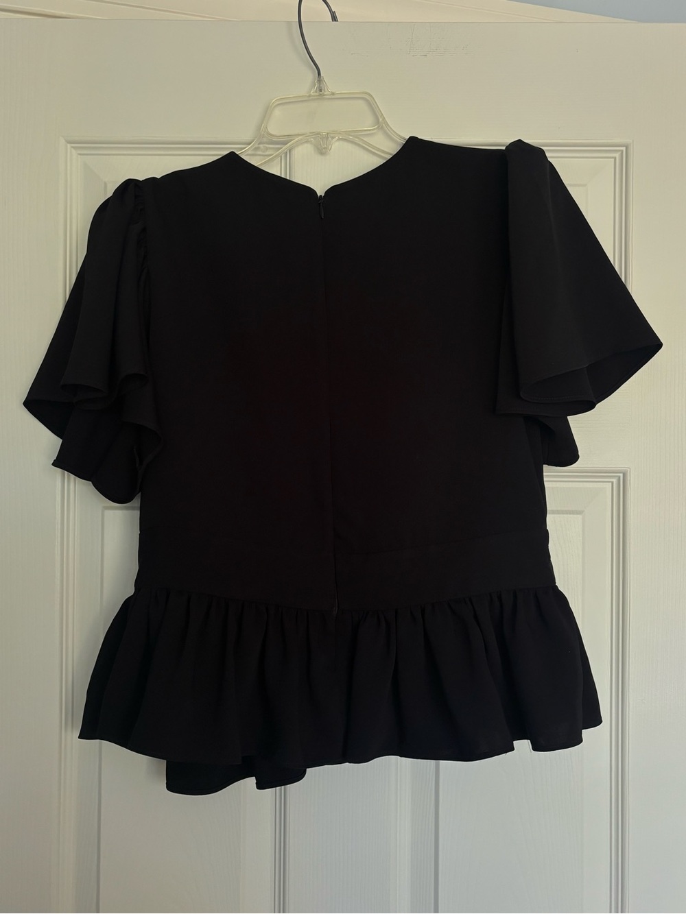 Black Ruffle Peplum Top - Picture 2 of 3